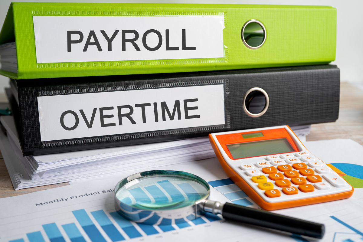 Payroll and Overtime. Binder data finance report business wi